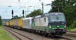 TX Logistik AG, Troisdorf [D] mit der ELL Vectron  193 234   [NVR-Nummer: 91 80 6193 234-2 D-ELOC] mit  185 537-8   [NVR-Nummer: 93 81 0185 537-8 A-TXLA] und Taschenwagenzug am Haken am 28.07.21 Durchfahrt Bf. Saarmund.
