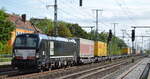 TXL mit der MRCE Vectron  X4 E - 610  [NVR-Nummer: 91 80 6193 610-3 D-DISPO] und Taschenwagenzug Richtung Rostock am 22.01.21 Durchfahrt Bf. Golm (Potsdam).