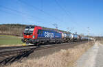 193 060-1 ist am 19.02.2025 bei Kerzell mit einem Containerzug unterwegs.