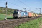 6193 136-9 mit einem Containerzug bei Kerzell am 30.04.2025.