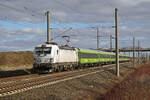 Am 15.02.26 bespannte 7193 606 der ELL den FLX 1337 von Berlin nach Basel. Hier rollt der Zug durch Brehna Richtung Halle(S).