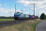 193 945 der RTB Cargo schleppte am 06.09.26 einen Containerzug durch Wittenberg-Labetz Richtung Dessau.