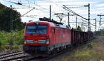 DB Cargo AG, Mainz mit ihrer  193 383  (NVR:  91 80 6193 383-7 D-DB ) und einem gemischten Güterzug am 20.09.23 Durchfahrt Bahnhof Dessau Hbf.