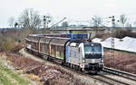 RTB 193 816-6 fährt mit einem Mischer in Langenisarhofen nach Süd durch.Bild 3.1.2019