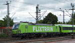 Flixtrain mit der MRCE Vectron  X4 E - 604  [NVR-Nummer: 91 80 6193 604-6 D-DISPO] und dem Flixtrain aus Köln bei der Einfahrt Bf. Hamburg-Harburg am 25.08.21