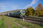 193 087-4 ist mit einem Aufliegerzug am 12.10.2022 bei Thüngersheim