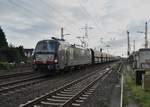 193 862 mit einem Selbstentladerzug am Haken bei der Durchfahrt in Lintorf.