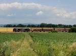 Die X 4 E-854 mit einem Güterzug am 19.06.2014 unterwegs bei Unternberg.