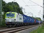 CAPTRAIN 193 783 mit Containerzug in Richtung NL in Rheine=Bentlage, 21.08.2023