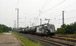 193 823 der EP Cargo rollte am 01.07.20 mit einem Kesselwagenzug durch Saarmund Richtung Schönefeld.