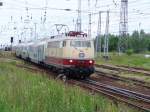 Die E03 001 mit einem Sonderzug nach Berlin bei der Ausfahrt aus dem Cargo-Bahnhof Rostock-Seehafen.(10.06.05)