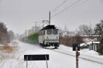 DP 57 verlsst mit einem Holzzug den Bf Stralsund Richtung Rostock am 16.02.2010