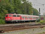 Bgelfalte 110 404-1 mit einem RE4 Verstrker am 30.08.2011 bei der Ausfahrt in Aachen West.