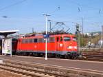 BR 110 418-1 am 21.04.07 mit der RegionalBahn aus Donauwrth, bestehend aus einem 1/2.Kl.-Mittelwagens, einem 2.Kl.-Mittelwagen und einem Karlsruher Steuerwagen auf Gleis 5 des Aalener Bahnhofs.