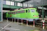 GfF 110 292-0 mit dem REWE Supermarktzug in Darmstadt Hbf am 04.12.21