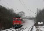 110 484-3 rauschte am Morgen des 6.1.2008 mit ihrer RB von Donauwrth nach Aalen durch den Haltepunkt Hofen.