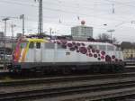 Von Bahnsteig 8 auf den Stutzen zwischen Gleis 11 & 12 am Mnchner Ostbahnhof ergab sich dieses Foto 110 329-0 mit Ihrer Scienc Express  Werbung.