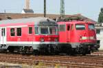 Ein RE1 Verstrker mit Karlsruher und 111 112 & ein RE4 Verstrker mit 110 494-2 stehen bers Wochenende abgestellt in Aachen Rothe Erde am 10.07.2010