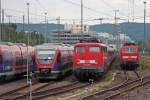 Ein 643.2, 110 398 und 111 149 stehen ber's Wochenende abgestellt in Aachen Rothe-Erde, fotografiert aus der an diesem Tag auerplanmig mit n-Wagen Verkehrenden RE9, 22.8.10