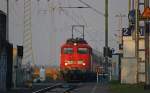 110 418-1 mit dem RE10462 nach Aachen Hbf bei der Einfahrt in Herrath, 3.3.11