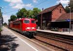 Durch Stommeln kommt am Sonntagnachmittag den 17.6.2012 die 110 489-2 mit der 115 114-1 kalt im Schlepp in Richtung Kln gefahren.