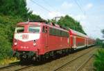 110 414 mit RE 12018 (Mnster–Essen) am 24.07.2001 in Sythen