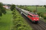 Am 15.05.2015 bespannte BTE 110 491-8 den Pilgersonderzug DPF 13486 (Lourdes - Kratowice), der aus PKP Intercity Wagen bestand, als sie zwischen Auggen und Müllheim (Baden) gen Freiburg eilt.