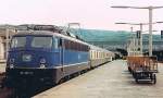 E 110 337-3 mit D 790 Lindau - Stuttgart - Kassel in Heidelberg am 20. Mai 1984. (gescanntes Foto) 