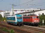 Die 223 062 und die 110 497 am 15.08.2009 abgestellt im Regensburger Hbf. (Foto entstand aus dem Fahrendem Zug)