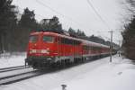 110 464 schiebt am 13.02.2010 einen Fuballsonderzug von Wolfsburg nach Leverkusen geshen in Gifhorn.