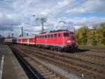 Die 110 415-7 mit N-Wagen auf der RB48 Route in Kln Messe/Deutz am 12.10.2009.