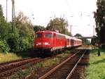 110 392-8 mit RB 35  Der Weseler  22520 Duisburg Hbf-Emmerich auf Bahnhof Empel-Rees am 23-8-2004.