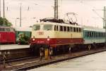 110 497-5 wartet im August 1997 mit ihrem RE nach Nrnberg Hbf in Crailsheim auf Ausfahrt.