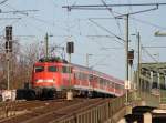 110 429-8 mit RE20077 nach Krefeld als Lr Richtung Kln Hbf bei der Durchfahrt in Kln Deutz, 6.3.11