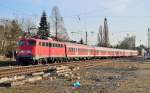 Einen RE4-Verstrkerzug schiebend verlsst die 110 457-9 den Rheydter Hbf in Richtung Aachen. Dienstag 26.3.2013