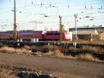 110 183 steht am BW Leipzig Hbf West vor einer halbwegs modernen Doppelstockgarnitur, 10.01.08