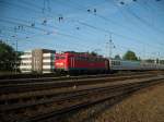 110 200 bei der Ausfahrt Rostock Hbf mit Sonderzug Berlin-Warnemnde am 28.06.2010