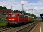 110 210-2 durchfhrt am 25. August 2010 mit einem Messwagen den Kronacher Bahnhof ber Gleis 4.