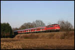 110448 hat mit ihrem Regionalzug nach Münster am 21.3.2005 gerade Hasbergen verlassen und ist an der Landesgrenze zu Nordrhein Westfalen unterwegs.