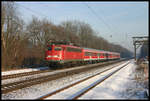 110412-4 erreicht hier am 29.1.2006 um 10.28 Uhr auf der Fahrt nach Münster den nächsten Haltebahnhof Natrup Hagen.