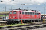 Ex DB Lok 110 169-0 steht auf einem Abstellgleis beim Badischen Bahnhof.