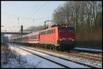 110216-9 kommt hier auf der Fahrt nach Hamburg am 29.1.2006 um 9.38 Uhr mit dem Schnee Express durch den Bahnhof Natrup Hagen.