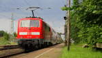 Ein Nachschuss von der 111 129 DB schiebt den RE4 aus Aachen-Hbf nach Dortmund-Hbf und kommt aus Richtung Aachen-West,Laurensberg,Richterich, und fährt durch Kohlscheid in Richtung Herzogenrath,Mönchengladbach,Neuss. 
Aufgenommen vom Bahnsteig 1 in Kohlscheid.
Bei Sonnenschein und Wolken am Nachmittag vom 13.6.2018.