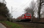 Ein Nachschuss von der 111 012 DB  schiebt den RE4 aus Aachen-Hbf nach Dortmund-Hbf und kommt aus Richtung Aachen-Hbf,Aachen-Schanz,Aachen-West,Laurensberg,Richterich,Kohlscheid,Herzogenrath und fährt durch Worm in Richtung Hofstadt,Finkenrath,Rimburg-Übach-Palenberg, Zweibrüggen,Frelenberg,Geilenkirchen,Süggerath,Lindern,Brachelen,Hückelhoven-Baal,Baal,Erkelenz,Herrath,Beckrath,Wickrath. Aufgenommen von der Grenzstraße in Herzogenrath,Worm. 
Bei Regenwolken am Nachmittag vom 28.2.2019.