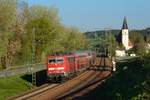 111 203 mit einem RE am 22.04.2011 bei Hausbach.