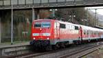 111 100 mit Fußballsonderzug RB 38977 nach Sinsheim beim Halt in Heidelberg-Altstadt.