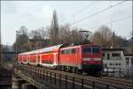 111 157 (9180 6111 157-7 D-DB) schiebt den Gegenzug RE4 (RE 10419)  WUPPER-Express  nach Dortmund. (07.03.2009)
