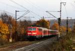 111 107 zieht RE 4608, Wrzburg-Frankfurt(Main), die Spessartrampe hinab in Richtung Laufach. 15.11.09