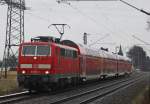 111 146 mit dem RE10414 nach Aachen an der ehem. Anrufschranke in Geilenkirchen 29.1.10