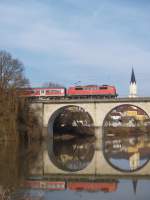 111-218 am 3.03.2010 mit dem Donau-Isar-Express in Vilshofen 
